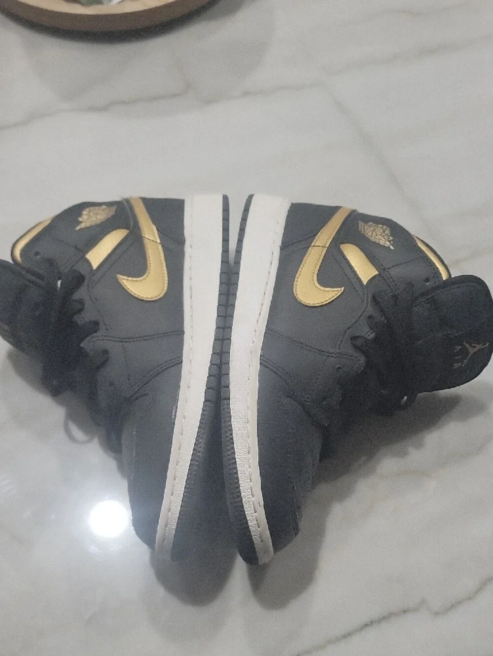 Nike Black High-Top Sneakers with Gold Jumpman